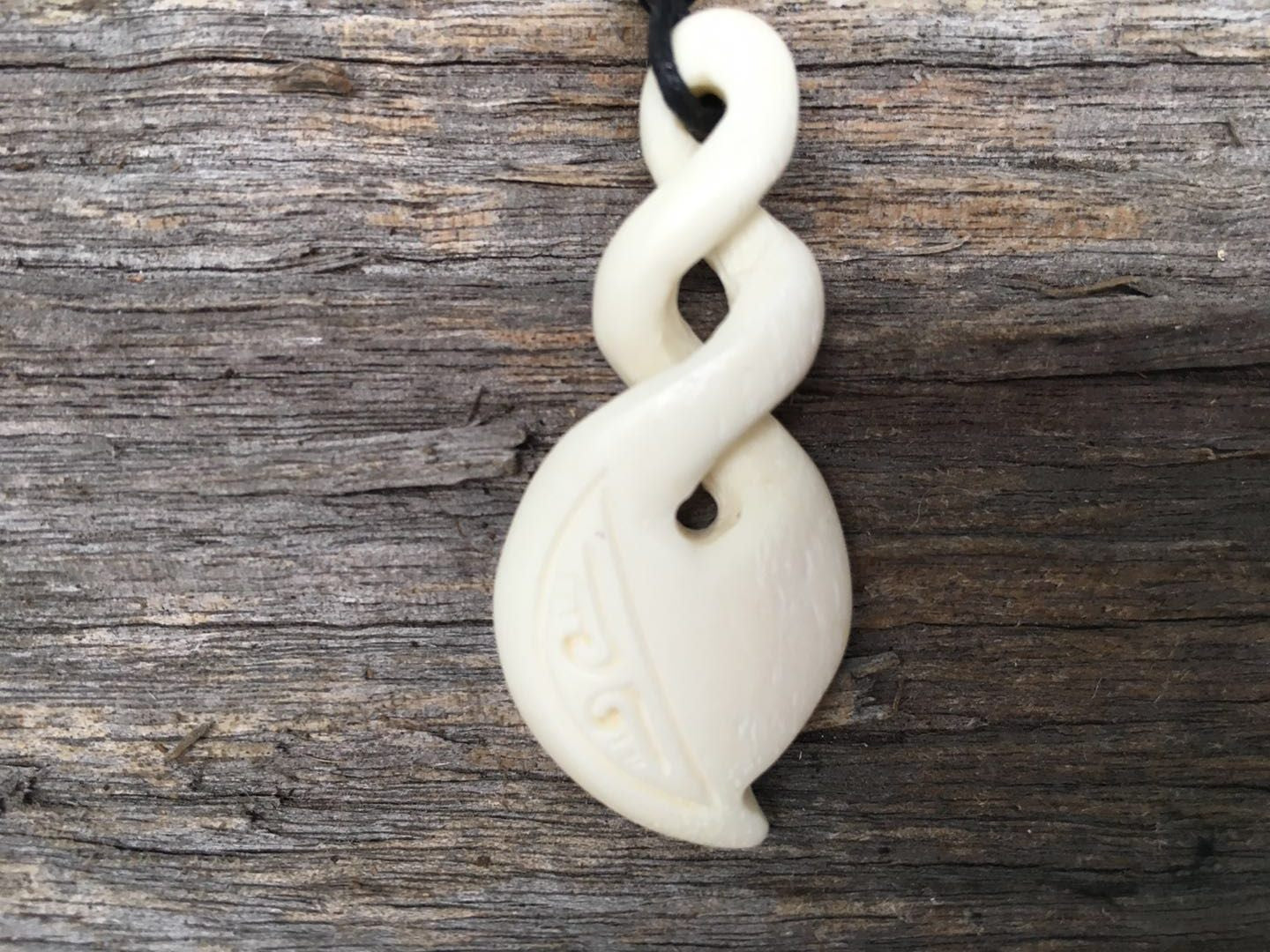 Bone Carving Double Twist Pendant – Handcrafted from Natural Beef Bone