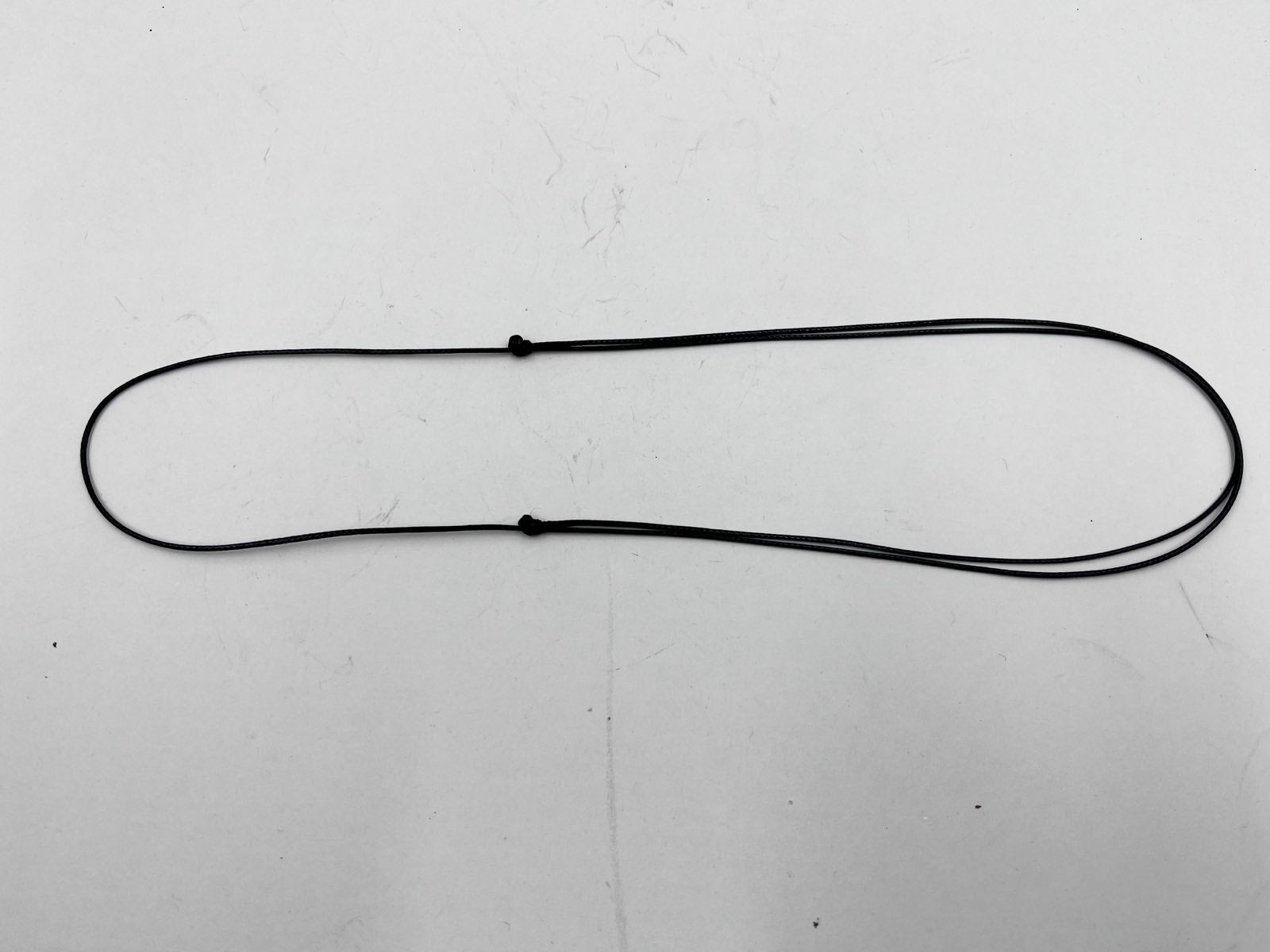 Adjustable waxed necklace cord for greenstone pendant, 1mm thick, with two knots
