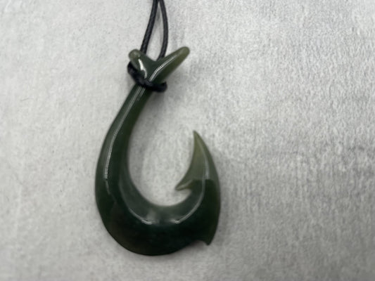 black jademaori fish hook Jade Necklace Nephrite jade has long been associated with spiritual grounding and emotional balance Black Jade Fish Hook Necklace