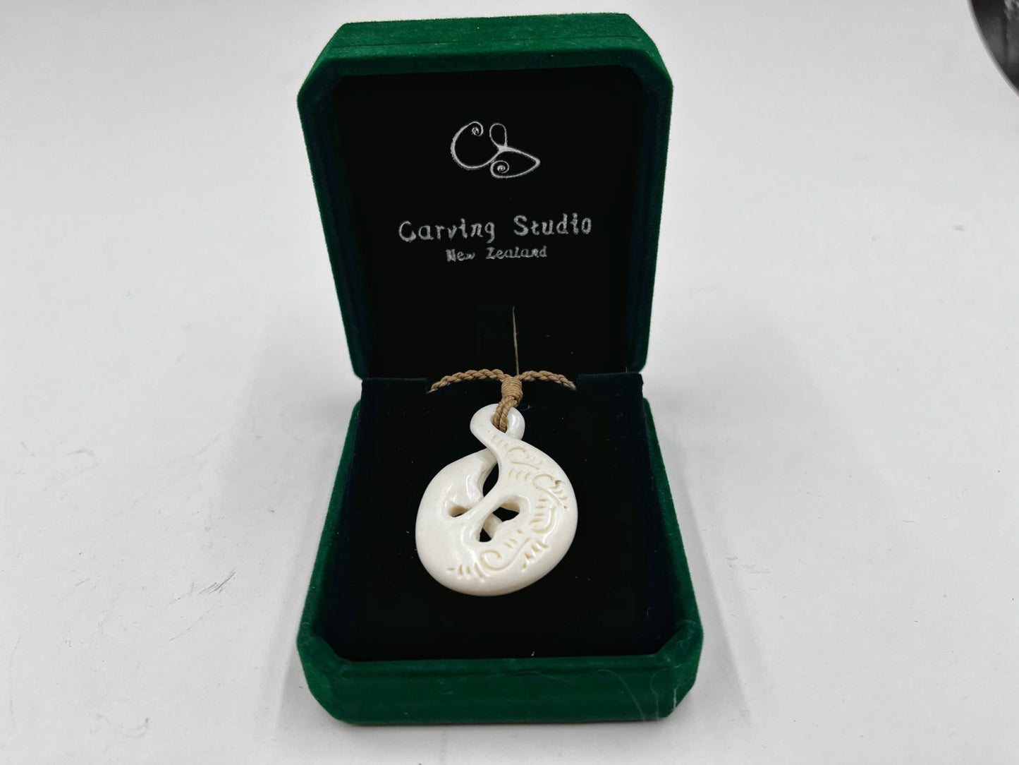 Bone double twist pendant with engraved patterns – Maori Pikorua necklace in gift box by Carving Studio