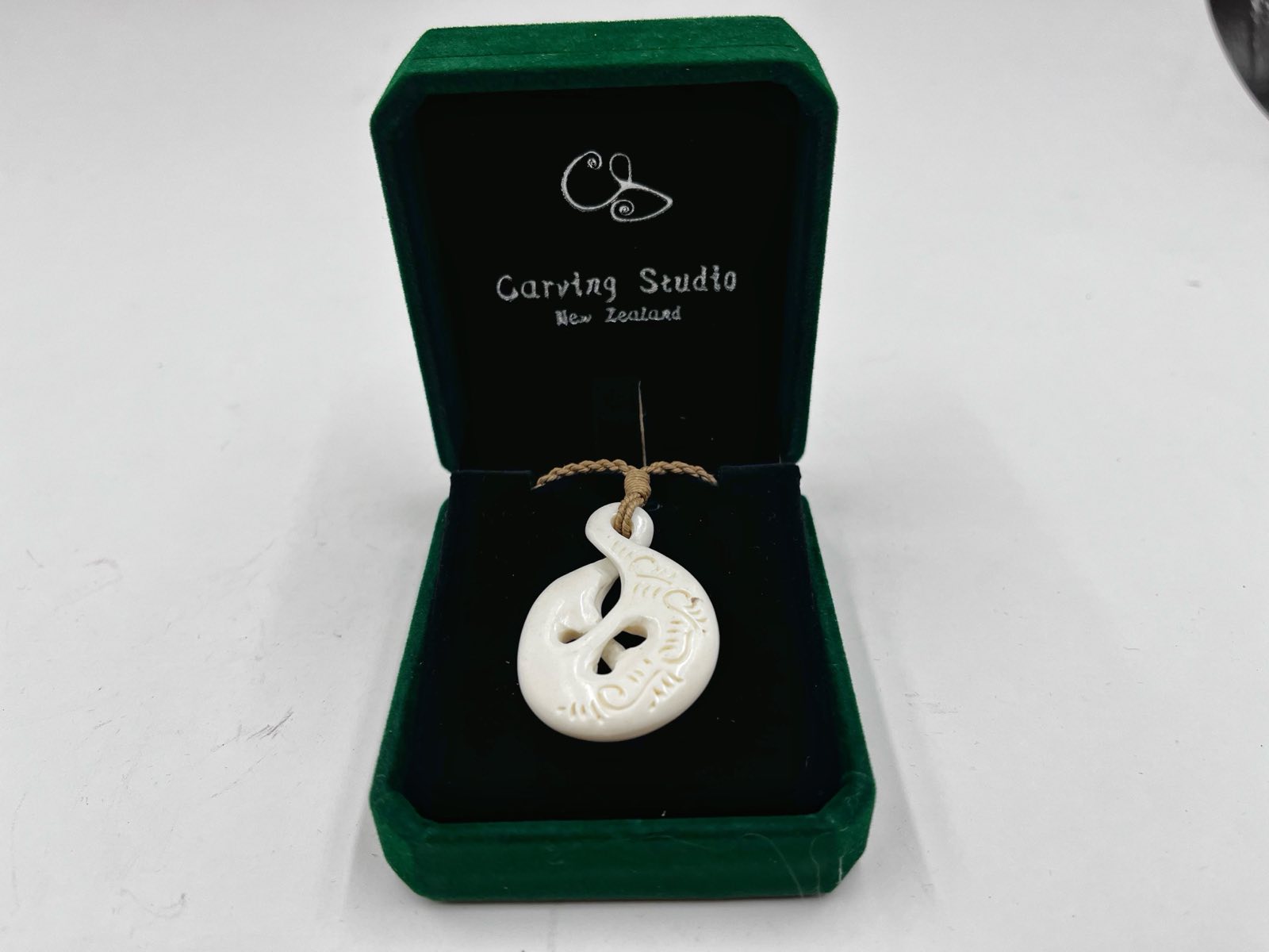 Bone double twist pendant with engraved patterns – Maori Pikorua necklace in gift box by Carving Studio