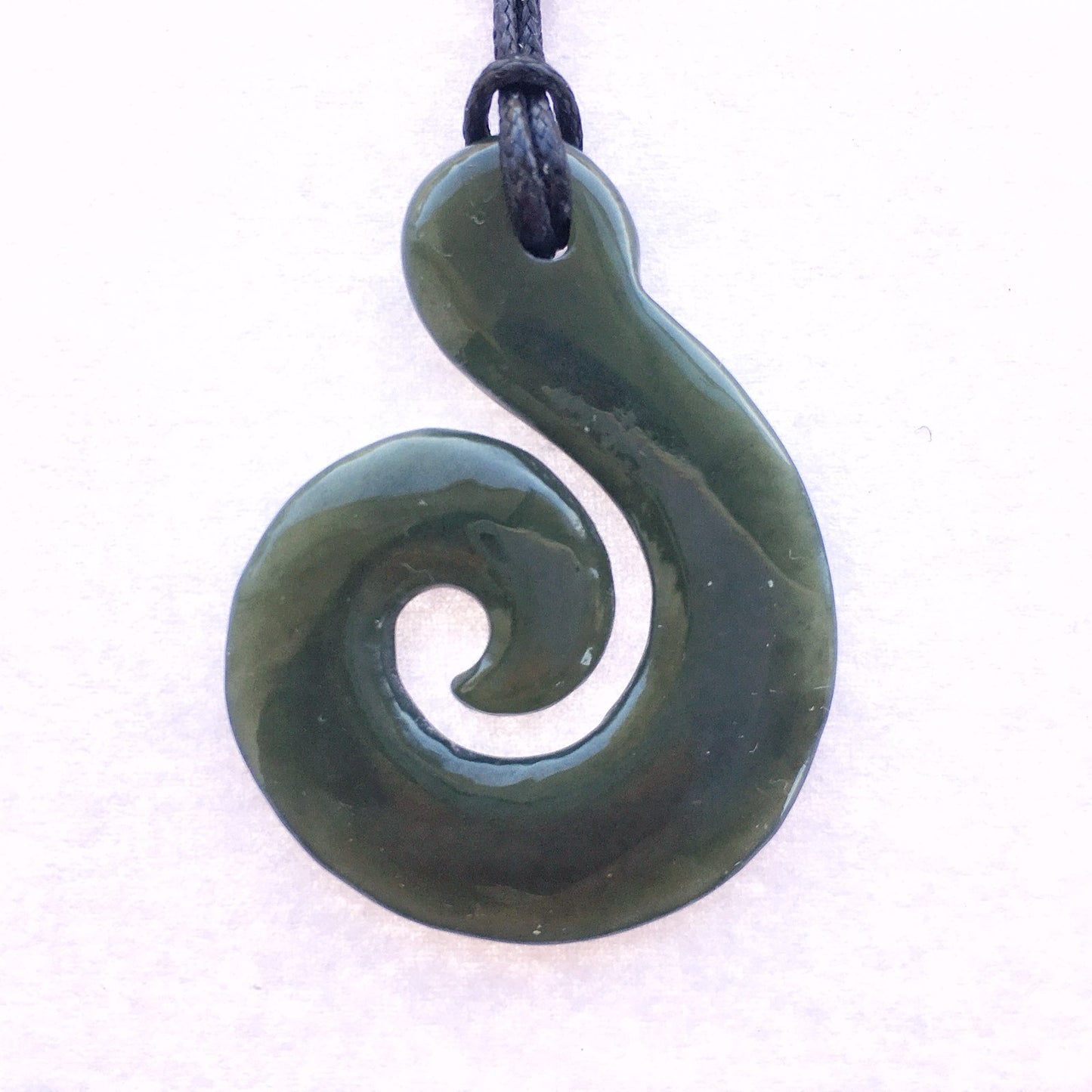 Greenstone Hook–Koru Pendant 42×32mm – Adjustable Cord, Velvet Gift Box Carving Studio NZ