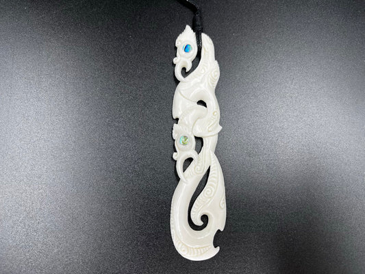 Māori Manaia bone carving pendant with paua shell eyes, 14cm long, NZ handmade